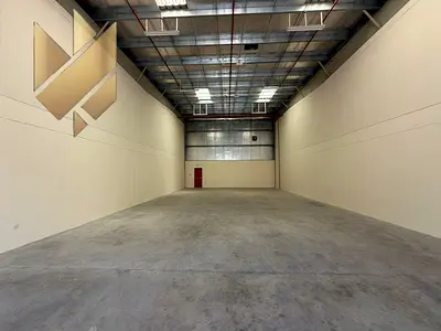 Fully equipped warehouse for rent in Industrial Area 18, Sharjah, with an area of 2,400 sq. ft., located on a main road at a competitive price.
