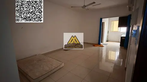A distinctive studio for rent in a vibrant location in Al Rawda 2 area, featuring a large space and a practical design that provides comfort and priva