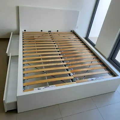 Ikea Queen size bed with mattress underneath 2 storage drawers available in perfect condition