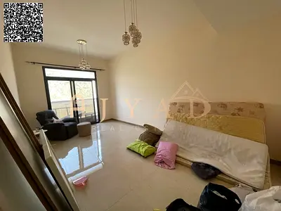 2BR apartment with hall in Al Jurf 3, Ajman. Store, laundry room, 2 master bedrooms, 3 baths, balcony, central AC, free month, great price.