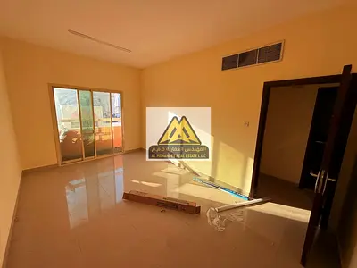 Luxury Apartments for Annual Rent in Al Nuaimiya - Spacious One-Bedroom Apartment with Central Air Conditioning