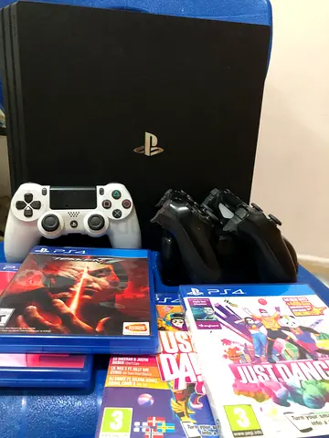 PlayStation 4 Pro bundle with 3 controllers and games