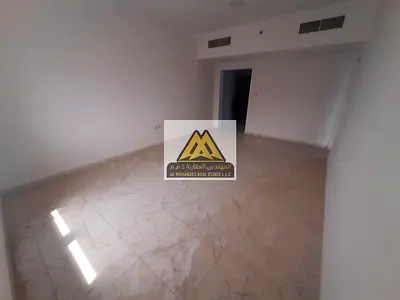 1-Bedroom Apartment for Annual Rent in Al Naeemiyah 2 Ajman on Main Street Spacious Layout Bathroom Wall Cabinets Central AC