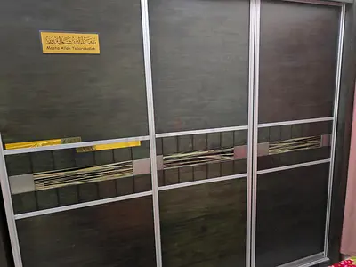 3-door Sliding Wardrobe with Decorative Panels - Good Condition