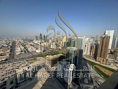 شقة غرفتين وصالة للإيجار في الخان الشارقة غرفة ماستر وغرفة غسيل وبلكونة بإطلالة مباشرة على البحيرة مواقف مجانية ومسبح وجيم بالاشتراك 4 دفعات موقع حيوي