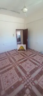 A spacious and well-maintained 2 bedroom apartment is now available for annual rent in Al Rumaila, A