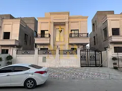 Classic villa for sale in a prime location with a full stone facade and high-end finishes. The price