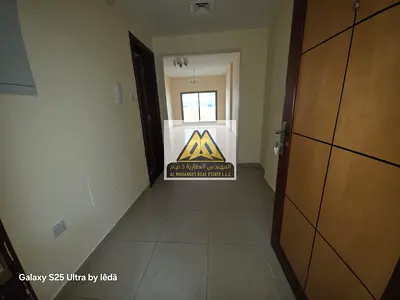 2-Bedroom Hall Apartment for Rent – Al Rashidiya, Ajman | 2 Master Bedrooms, 3 Bathrooms, 3 Balconies, Open View, Near Grand Mall