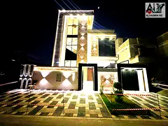 Own a villa with a ground floor, first floor, roof, and 5 master bedrooms, overlooking a garden in t