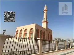 Land near the main road and mosque in Manama 9