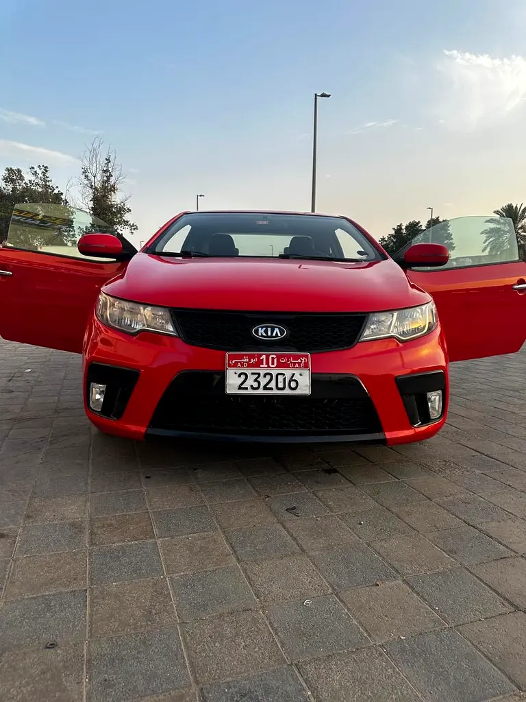 Kia Cerato 2012 — photo 1 of 12