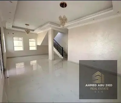 Modern 2‑story villa in Al Zahia, Ajman. Large yard, terrace, 3 master bedrooms, maid’s room, 3100 sq.ft land, 2700 sq.ft built‑up. Freehold, no fees,