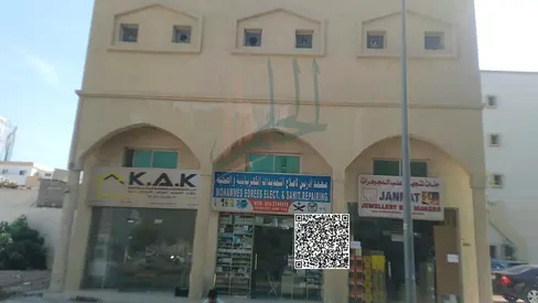 The property is as follows: * Al Nakheel 2 * Traditional house + small building * The building contains: * 3 shops * 3 studios * Plus 10 rented room