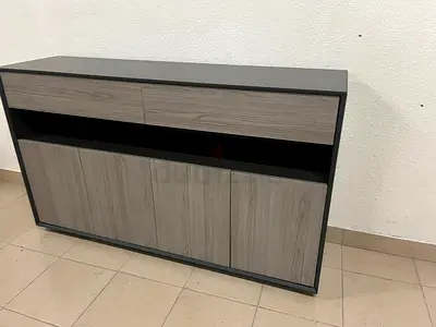 Modern buffet with a low-profile design and gray wood finish