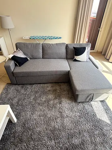 Light grey L-shaped sofa with chaise with sofa bed (never used) (basically new condition)