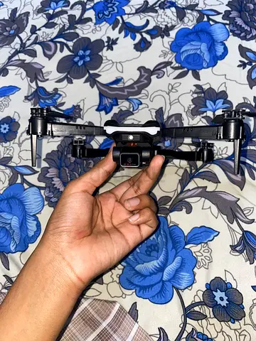 Compact foldable camera drone with built-in camera - used