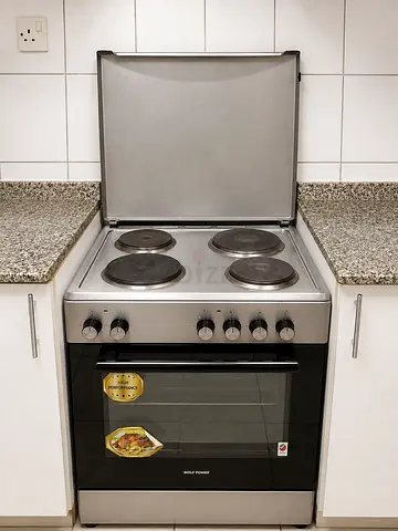 Stainless Steel 4-Burner Electric Cooker with Oven (Good Condition)