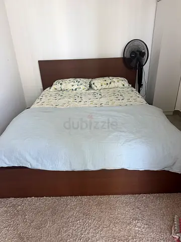 Queen wooden bed frame with headboard in good condition and mattress