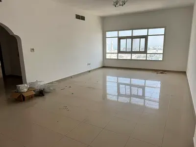 Largest room and living room for rent in Al Butinah, master bedroom with sea view, 2 bathrooms, built-in wardrobes, large area and prime location clos