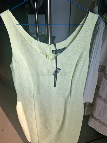 Light yellow sleeveless womens dress/top - size tag attached