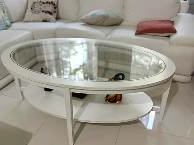 White Oval Glass Top Coffee Table with Lower Shelf
