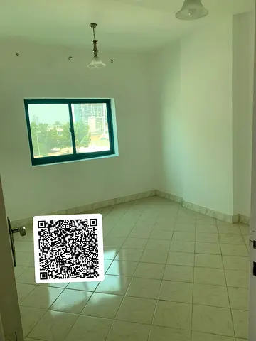 In the heart of Sharjah, specifically in the quiet and distinctive Al Mamzar area, a wonderful apartment is now available for annual rent, suitable fo