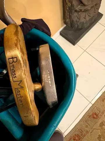 Women half set clubs including Brass Master and Dunlop 8007