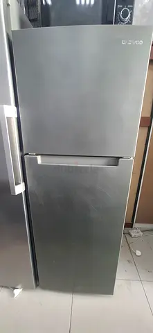 Silver Double-Door Refrigerator with Bottom Freezer - Good Condition
