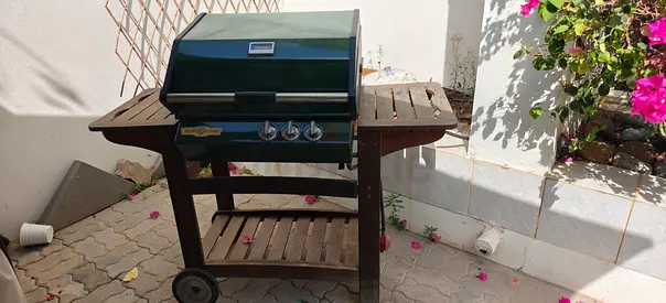 Used outdoor gas BBQ grill on wooden trolley - good working condition