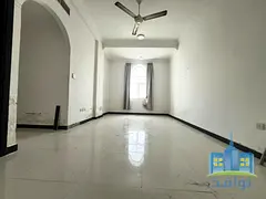 Two-bedroom apartment with a living room directly on Sheikh Ammar Street.