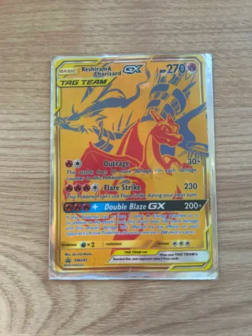 Rare Pokemon promo card Charizard and Reshiram