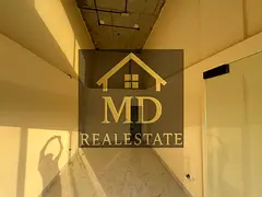 Commercial shops for annual rent in a strategic location on a main street in Al Jurf - various space