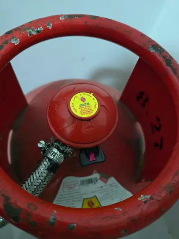 Used LPG Gas Cylinder (Red) with Hose - Good Working Condition. It’s a best offer for this product.