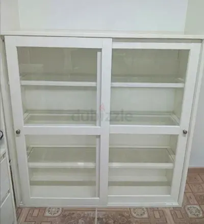 White Wooden Glass-Front Cabinet with Sliding Doors
