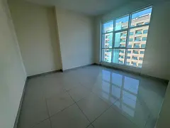 Luxury two-bedroom apartment with a living room in Al Khan Corniche, Sharjah, available for annual r