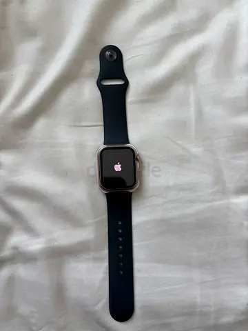 Selling my Apple Watch SE in rose gold with a black band.