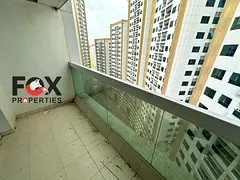 2BR apartment for annual rent in Pearl Towers Rashidiya 1, balcony, free parking, spacious layout, p