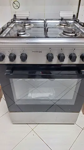 4 burner gas cooking range with oven and grill - stainless steel, good working condition.