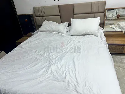 Queen/King upholstered bed frame with bedside tables - good condition with mattress king size