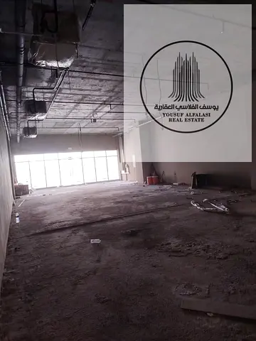 Shop for rent in Al Amerah, area 5,462 sq m, prime location, price AED 491,580 per year
