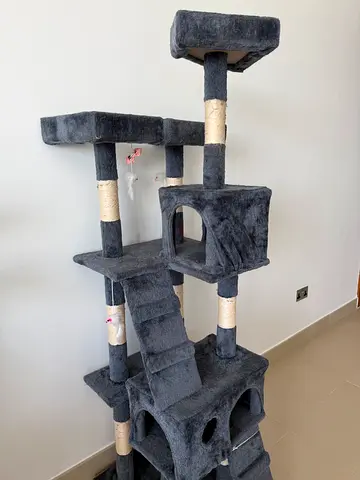 Tall multi-level gray cat tree with condos and scratch posts