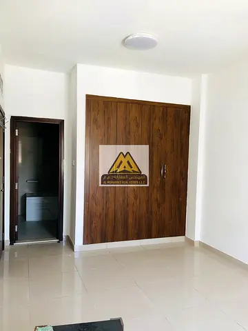 Upscale Family Residence Near Ajman University - Two Bedrooms and a Spacious Living Room