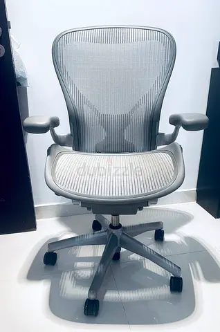 Used ergonomic mesh office chair (armrests, adjustable, swivel) - light grey