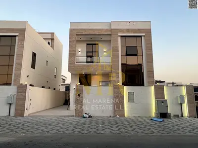 Luxury villa for sale in Al Yasmin, two floors and a roof, 7 master bedrooms, electricity, water an