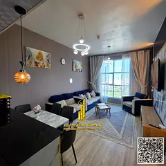 Beautiful furnished one-bedroom apartment with new furniture for monthly rent in Ajman - Al Nuaimiya