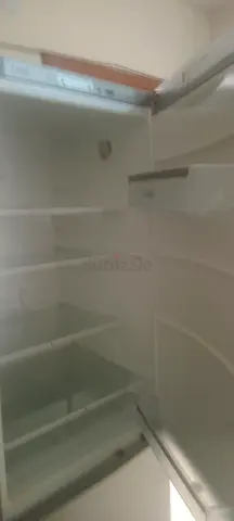 Used stainless steel refrigerator with bottom freezer - good condition