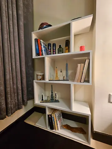 White modern wall-mounted shelving unit / bookcase - good condition