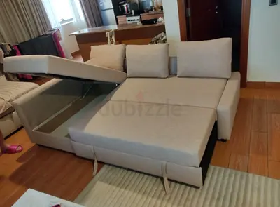Ikea L Shape Sofa cum bed with big storage in L