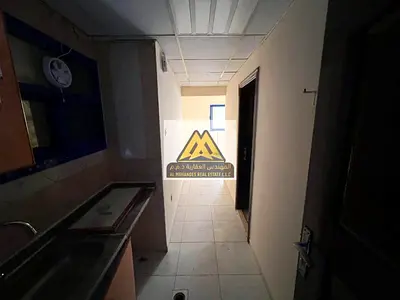 Studio in Al Nuaimiya 2, Ajman, large space, semi-open kitchen, central AC, AED 18,000 yearly, 4 payments, prime location close to services, quiet res