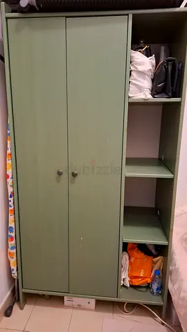 Green two-door wardrobe with open shelving - good condition